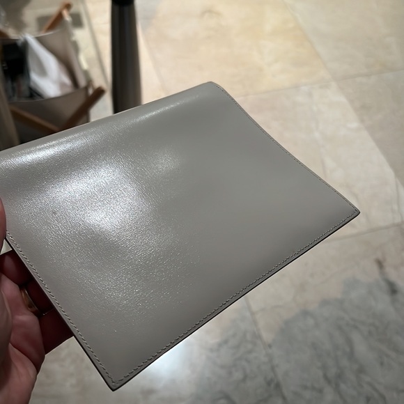 Yves Saint Laurent Cream and White Clutch with Gold Logo - Picture 7 of 7